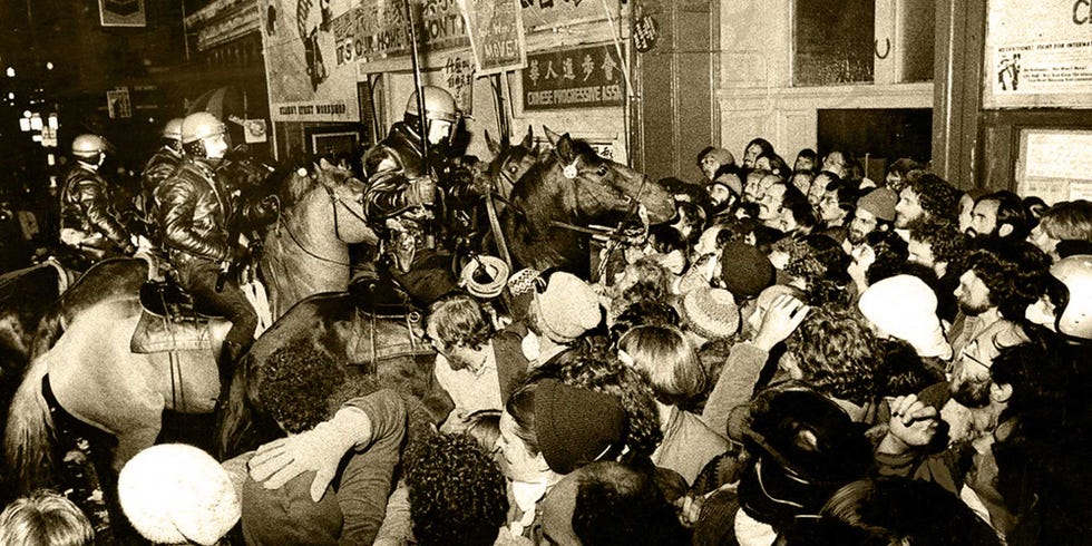 protesters battle police at the old international hotel in 1977