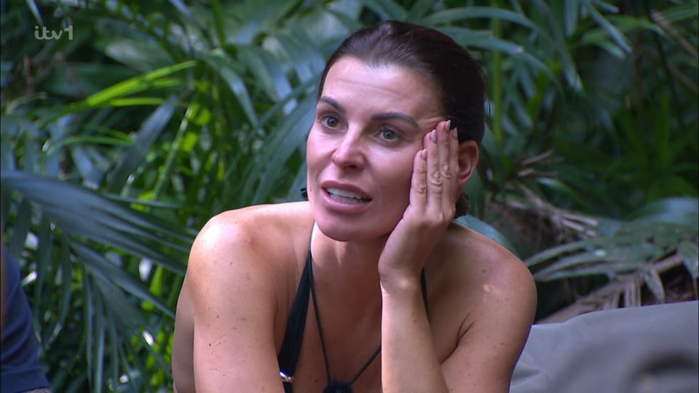 i'm a celebrity's coleen rooney sitting down in camp with her head in her hand