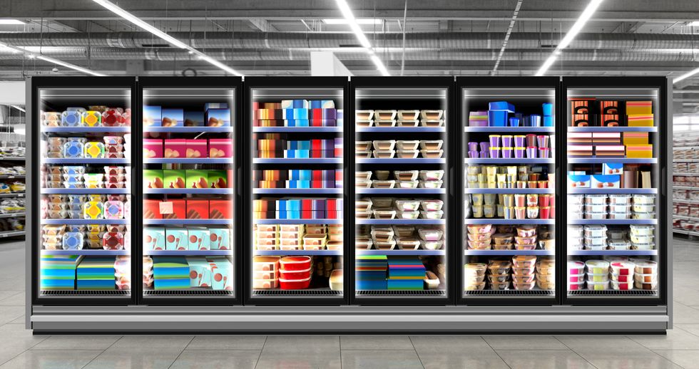 ice cream and birthday cake in fridge at supermarket