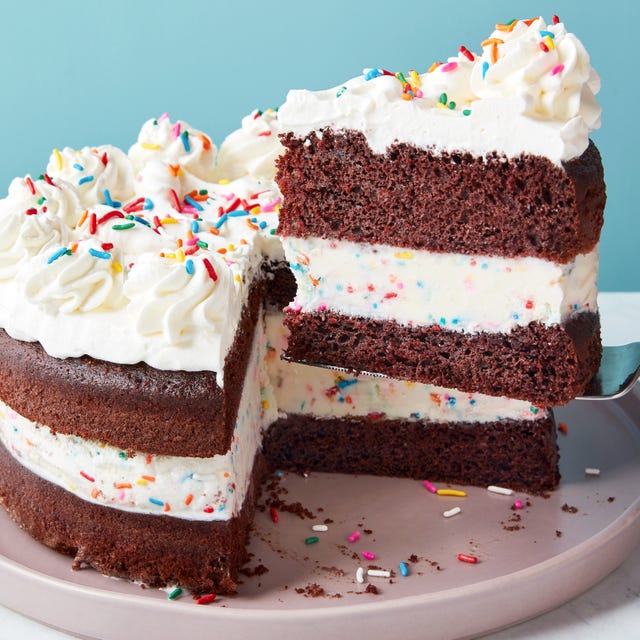 layers of chocolate cake and ice cream with sprinkles