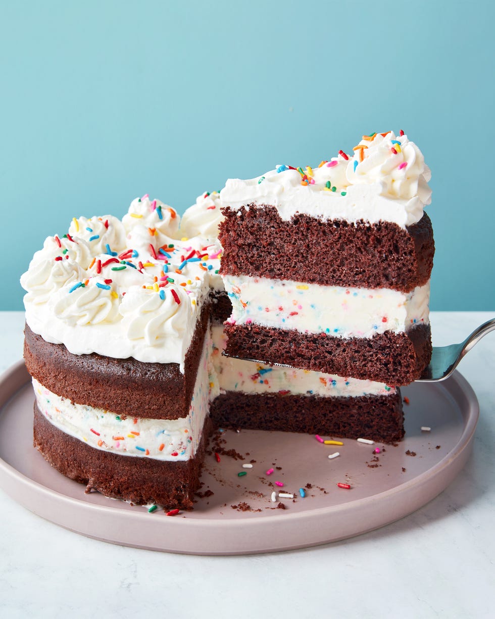 layers of chocolate cake and ice cream with sprinkles