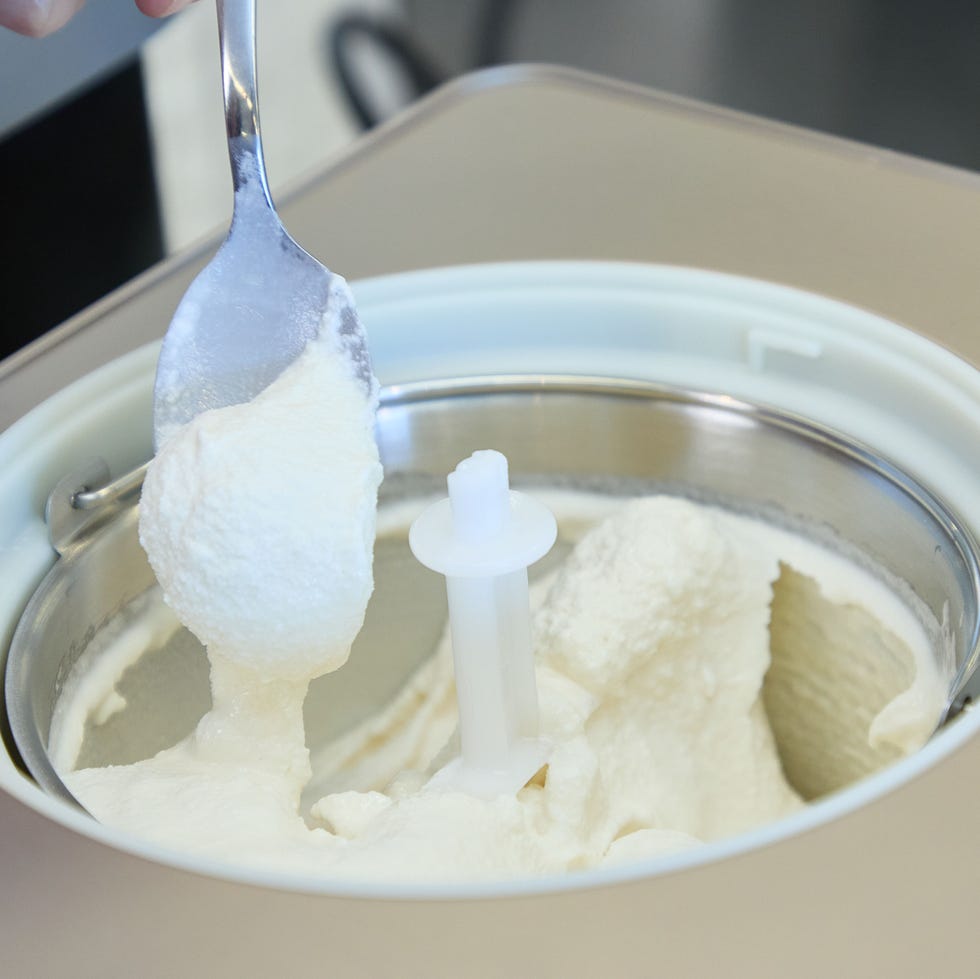 best ice cream makers ice cream maker with a spoon scooping out vanilla ice cream