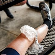 ice pack on woman cyclist's knee
