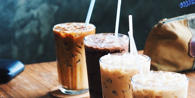 Iced Coffee In A Brown To Go Cup by Stocksy Contributor Simone