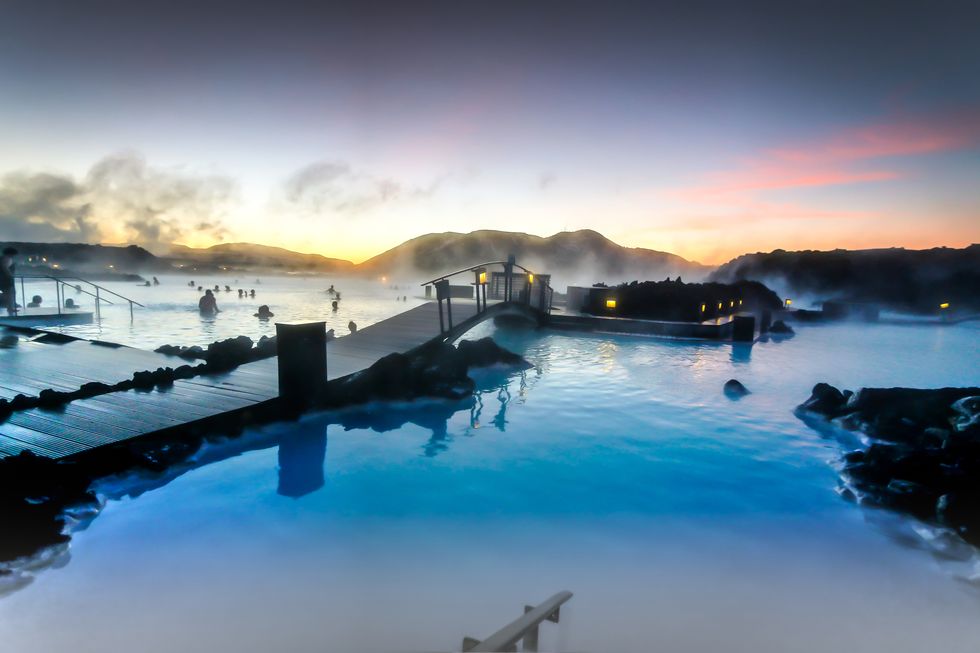 the sun was rising at the blue lagoon and it was a delight to swim in the warm baths with the outside temperature around zero degrees created a slight mist in the air as the cold air made contact to the warm water