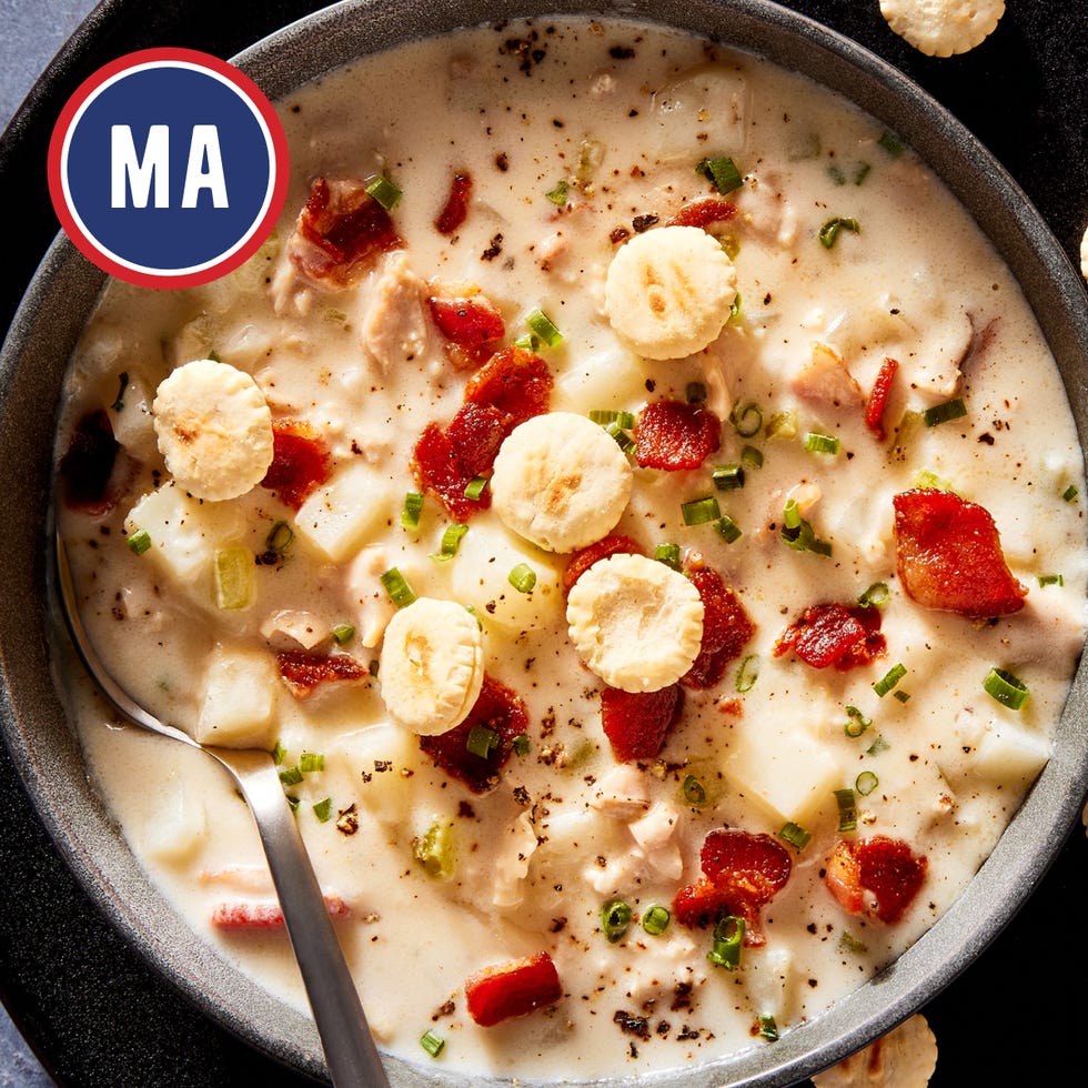 bowl of creamy soup with bacon and crackers