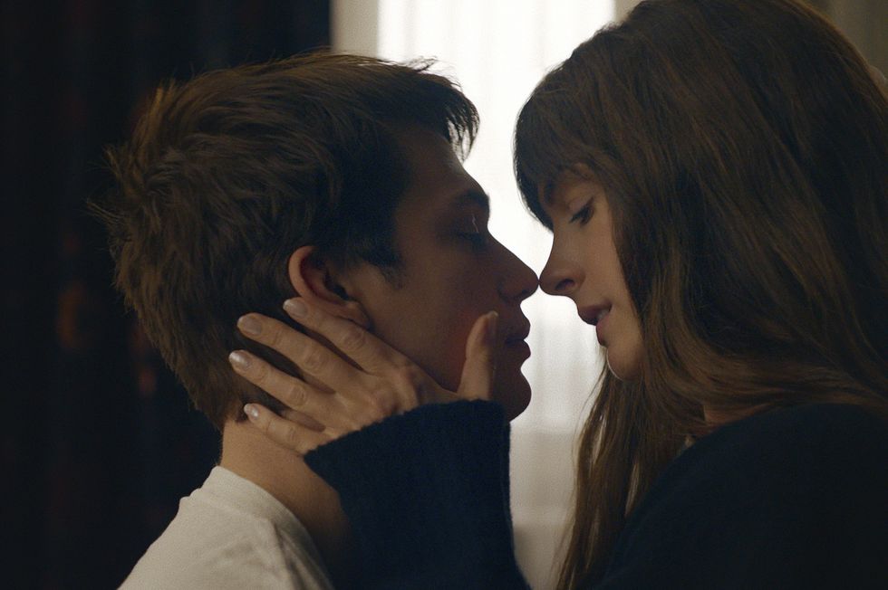 nicholas galitzine as hayes campbell and anne hathaway as solene