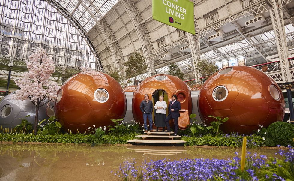 laurence llewlyn bowen, rosemary shrager and david domoney unveil the conker living home at ideal home show, in partnership with natwest the home is on display at olympia london from 11 27th march and showcases the latest in sustainable living idealhomeshowcouk