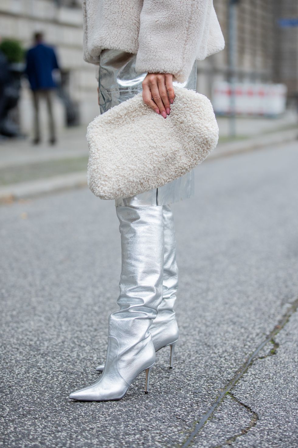 berlin, germany   november 16 tina haase is seen wearing solace london metallic silver skirt, cos teddy jacket and clutch, brian atwood x scarosso silver boots on november 16, 2021 in berlin, germany photo by christian vieriggetty images