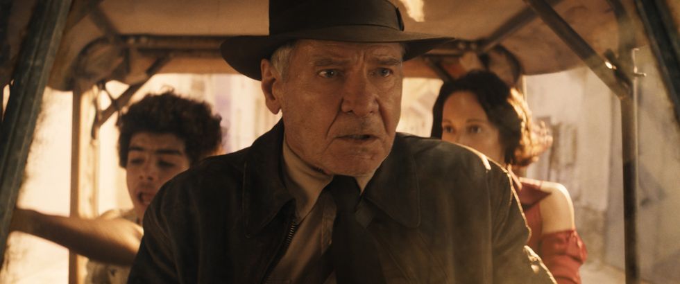 l r teddy ethann isidore, indiana jones harrison ford and helena phoebe waller bridge in lucasfilm's indiana jones and the dial of destiny ©2023 lucasfilm ltd tm all rights reserved