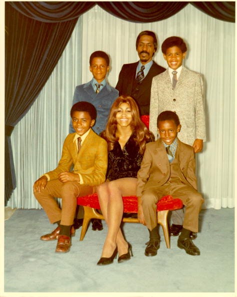 tina turner surrounded by her husband ike and four sons for a family portrait
