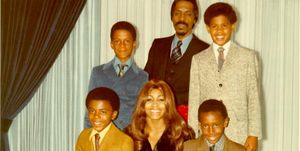 tina turner surrounded by her husband ike and four sons for a family portrait