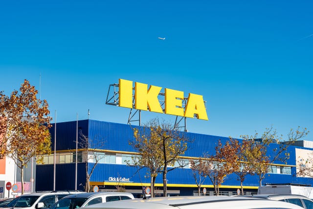 ikea store with prominent signage against a clear blue sky
