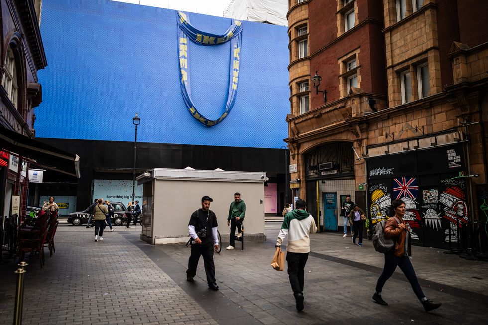 london, united kingdom october 02 a large scale replica of the blue ikea shopping bag is seen surrounding the site of a new store in the oxford street retail area