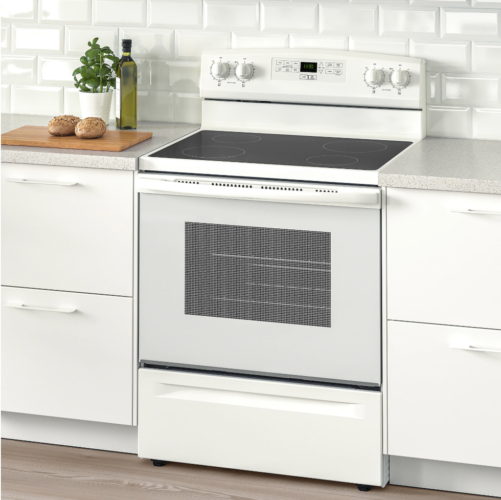 Kitchen stove, White, Major appliance, Kitchen, Furniture, Kitchen appliance, Home appliance, Drawer, Countertop, Room, 
