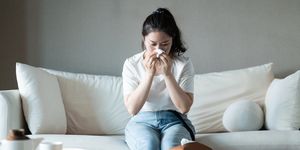 woman with cold symptoms