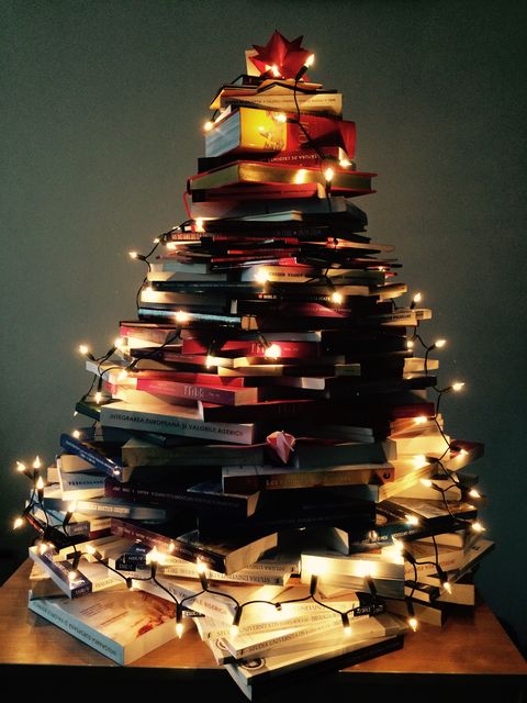 illuminated christmas lights on books