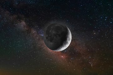 illuminated moon and the milky way