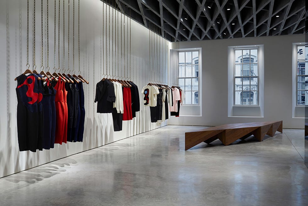 Floor, Flooring, Textile, Interior design, Clothes hanger, Ceiling, Carmine, Fixture, Hardwood, Hall, 