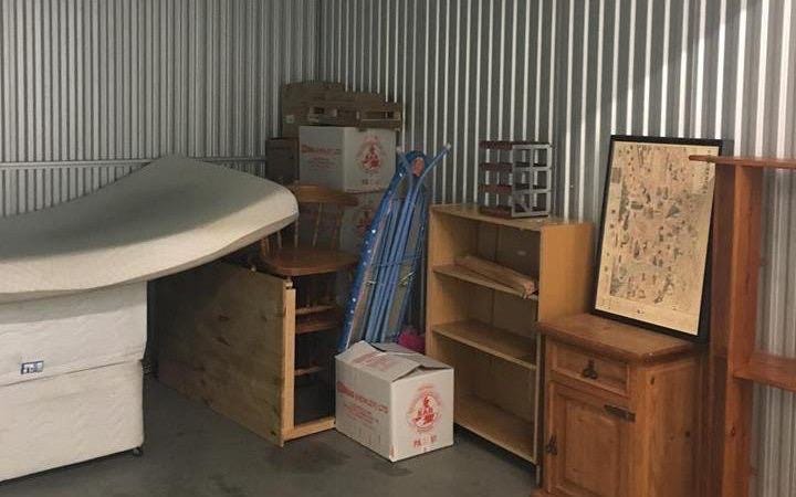 storage facility containing various furniture and boxes