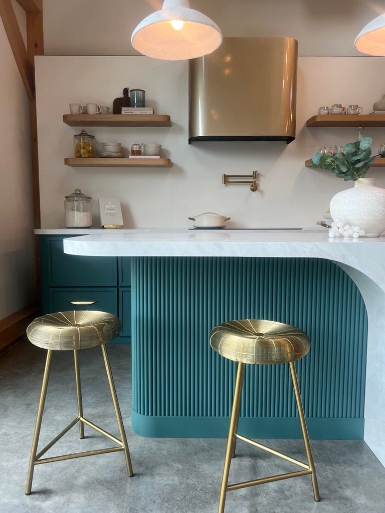 kitchen with blue accent cabinets