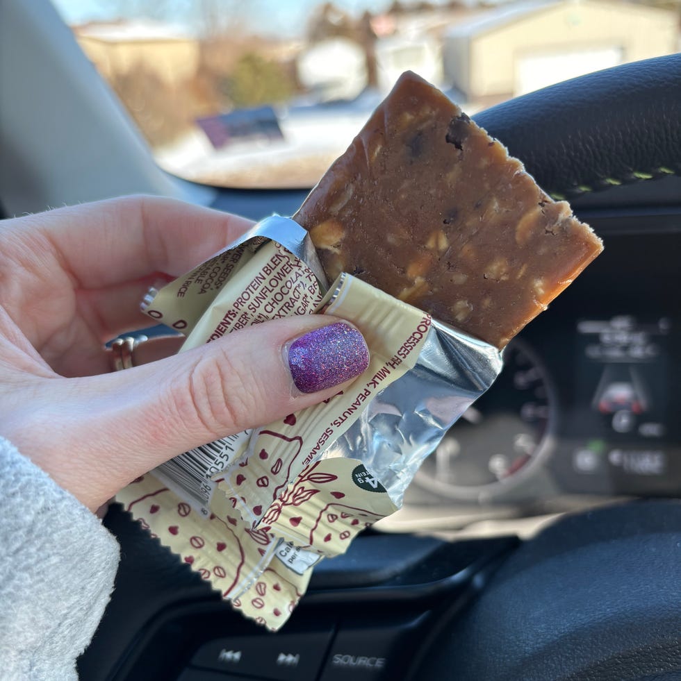 A GH+ taste tester trying a protein bar a gh+ taste tester trying a protein bar