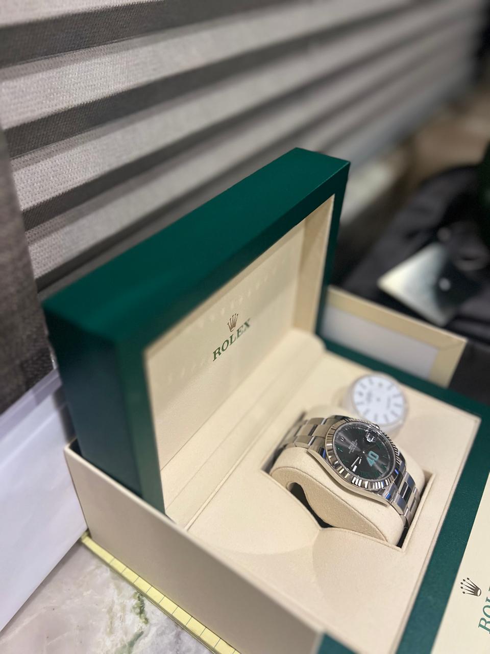 a box with a watch inside