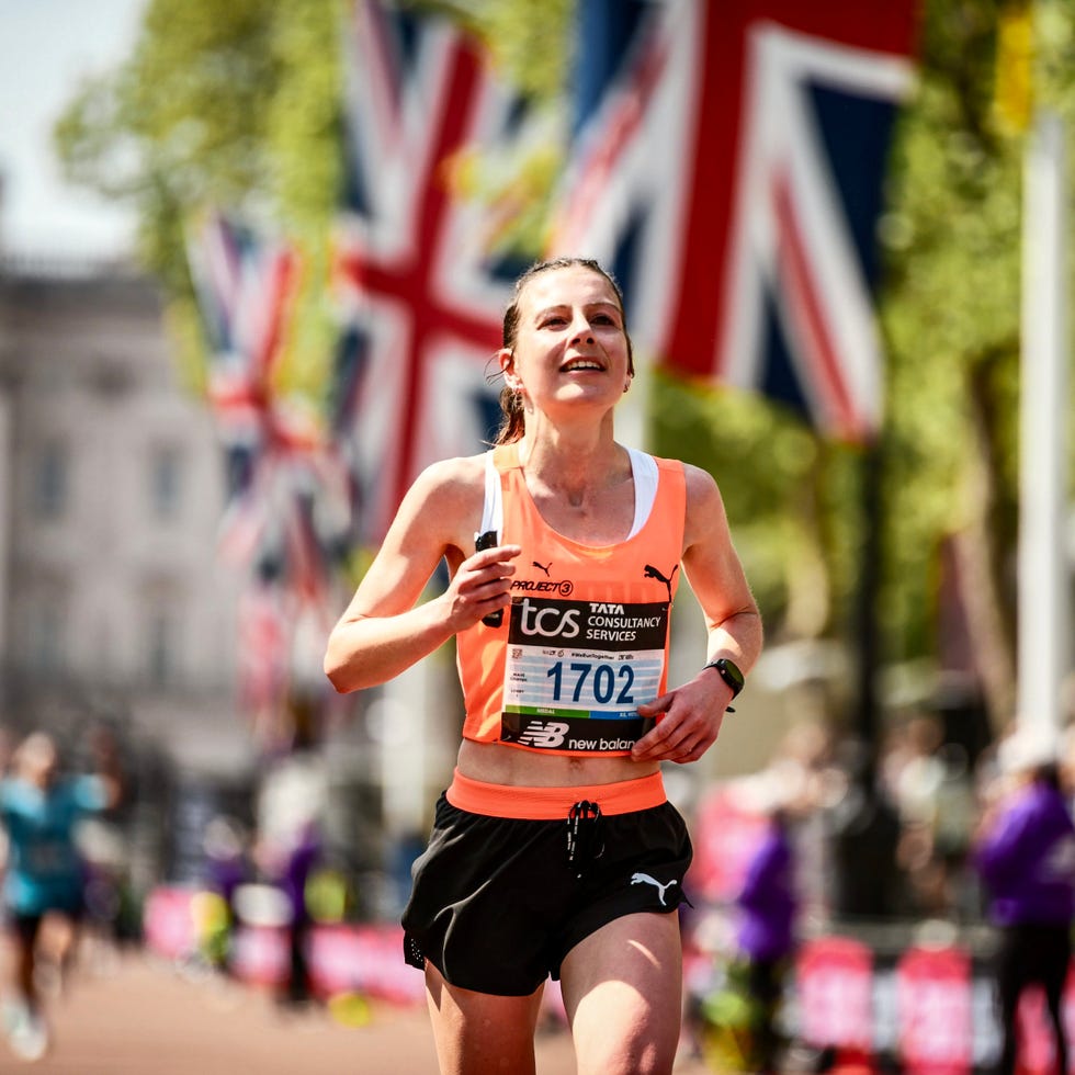 a runner participating in a marathon with a race number