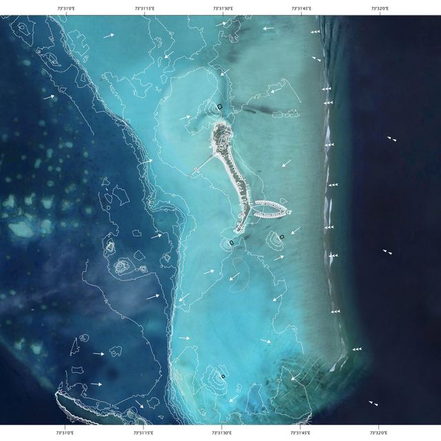 a satellite image of the maldives, where researchers are rebuilding islands and sandbars