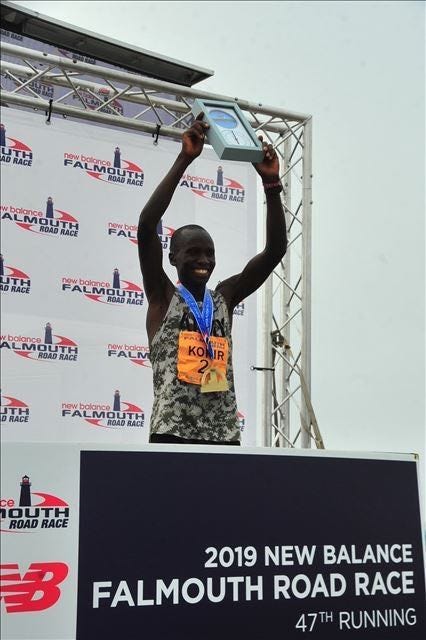 Text, Technology, Advertising, Poster, Font, Stage equipment, Electronic device, Podium, Competition, Banner, 