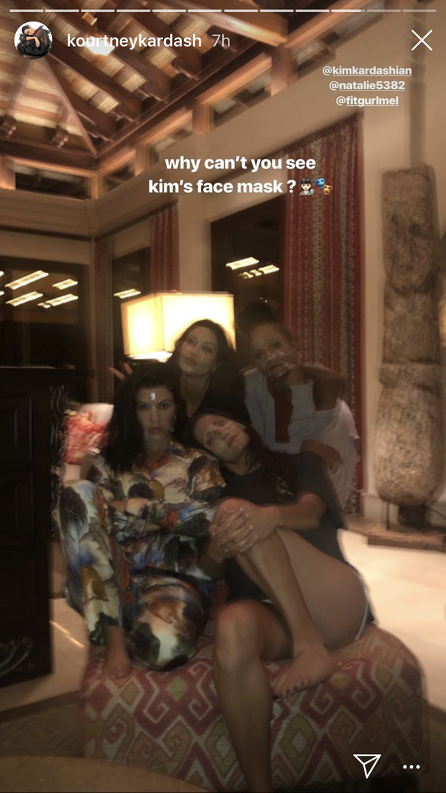 Kourtney doing face masks with Kim and friends during their vacation
