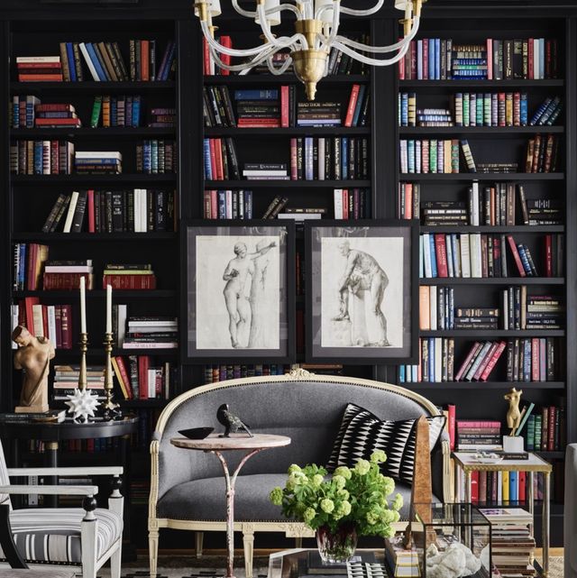a room with a shelf of books