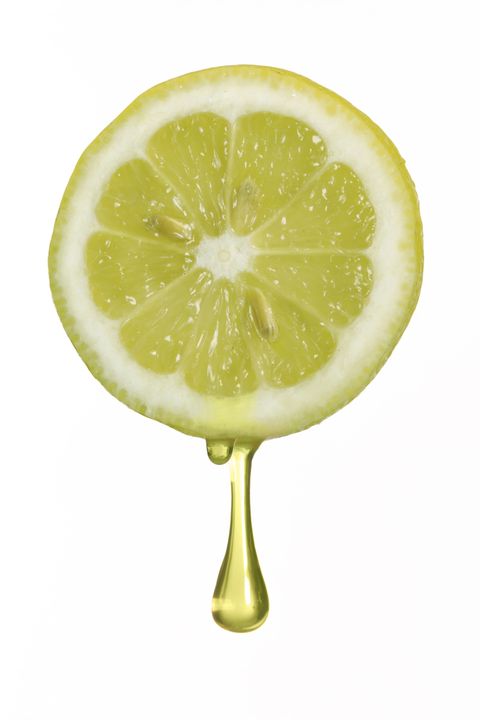 Image of one lemon slice with dripping juice