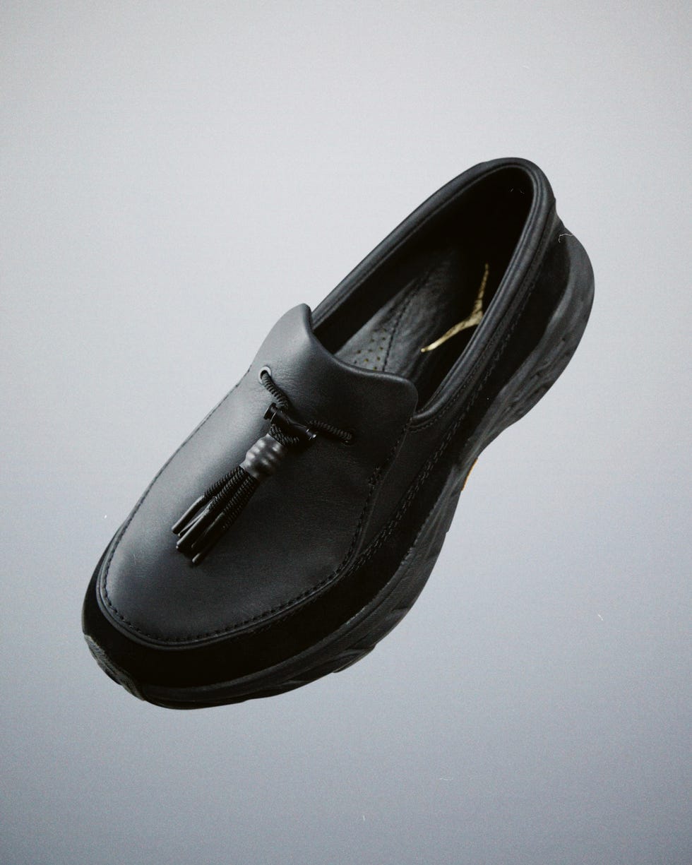 black slipon shoe with tassel detail