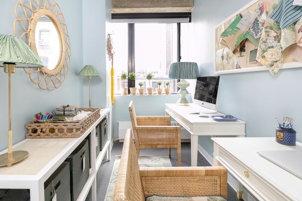 jennifer hunter design office in new york with blue walls and white desks