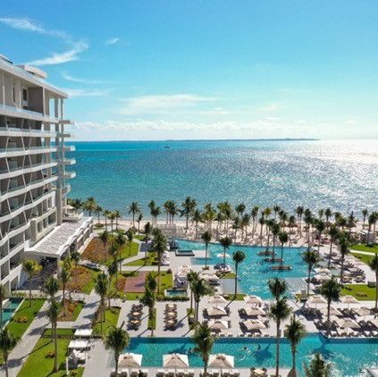 the hotel, pool and beach at garza blanca resort and spa cancun, a good housekeeping pick for best all inclusive family resorts