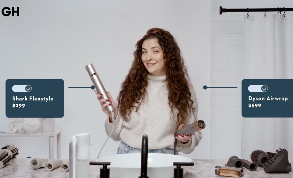 a person a dyson airwrap and shark flexstyle
