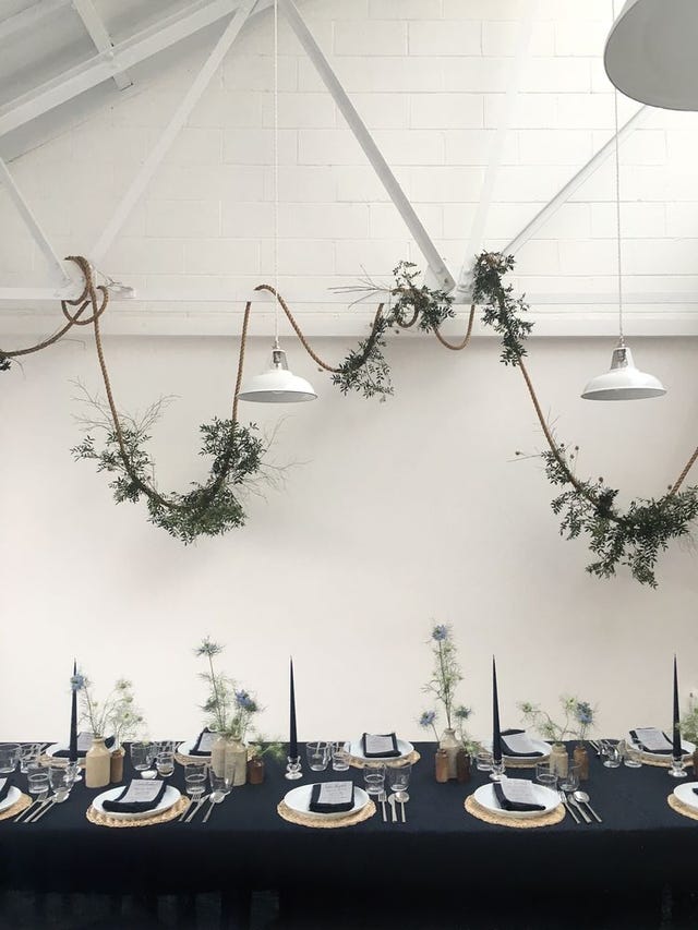 dining table with greenery