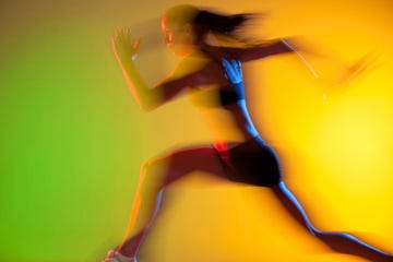 woman running on neon background
