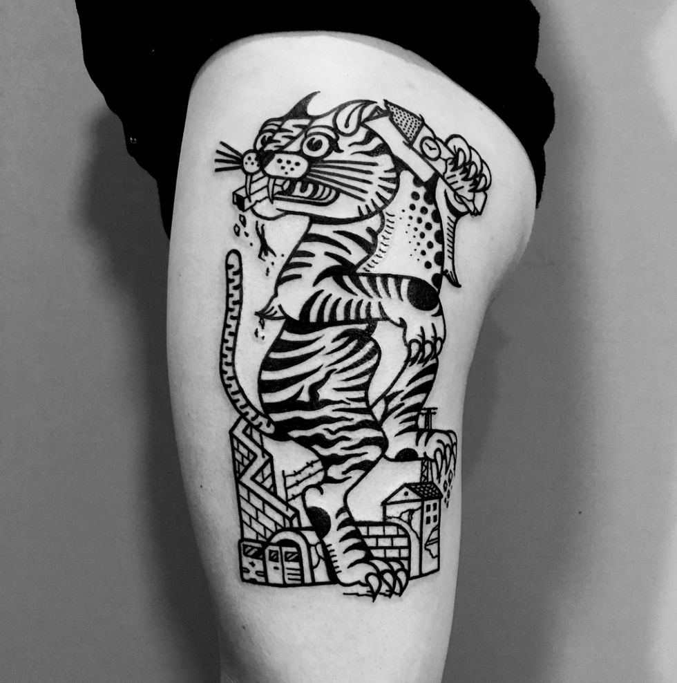 Arm, Tattoo, Human leg, Shoulder, Leg, Temporary tattoo, Felidae, Joint, Tiger, Calf, 