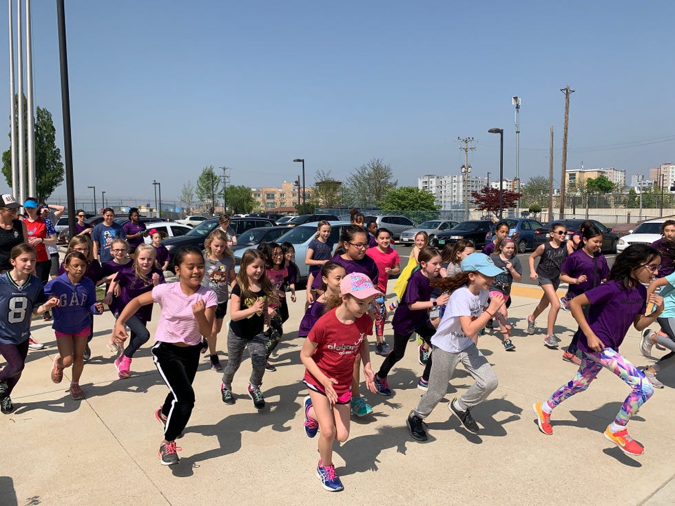 go girls go participants run in the inaugural 5k to mark the end of their first season