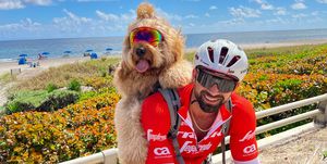 brodie the bike riding goldendoodle and his owner cliff out on a ride