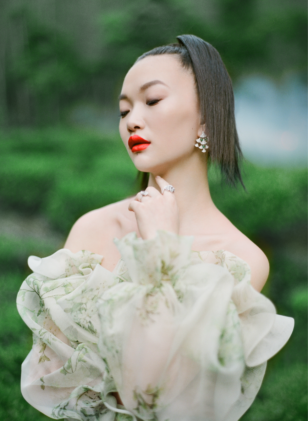 Clothing, Human, Lip, Hairstyle, Petal, Shoulder, Earrings, Dress, Wedding dress, Eyelash, 