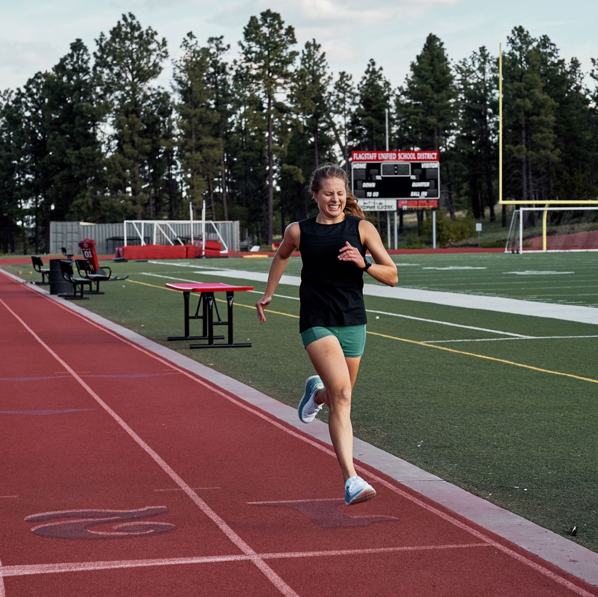 woman running on track