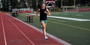 girl running on track