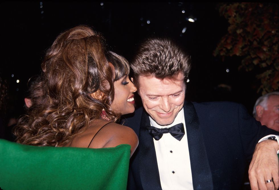 Iman and David Bowie sharing an intimate moment at a black-tie affair