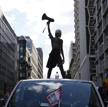 activist imarn ayton stands on top of a car during an anti racism protest near trafalgar square on june 20, 2020 in london