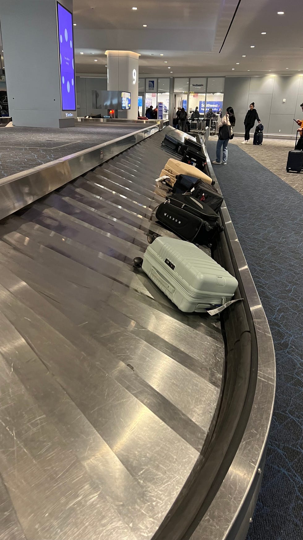 beis checked bag at baggage claim