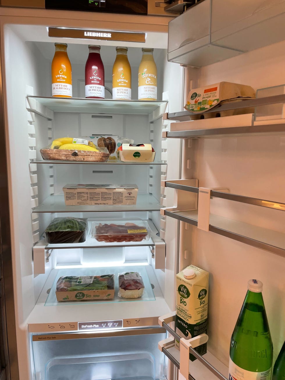 a refrigerator is filled with food