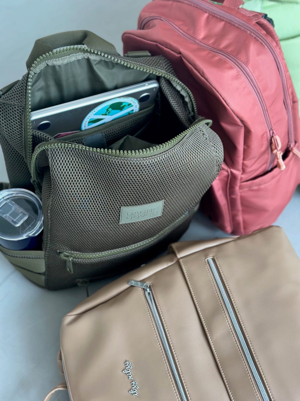 backpack diaper bags from dagne dover, itzy ritzy, state bags and calpak being tested in the good housekeeping institute parenting lab